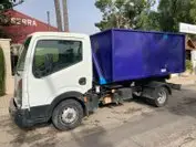 Camión contenedor en Villaverde